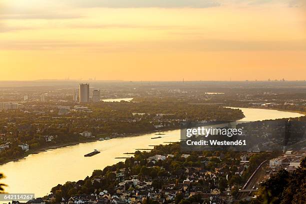 germany, bonn with rhine river at sunset - dämmerung stock-fotos und bilder