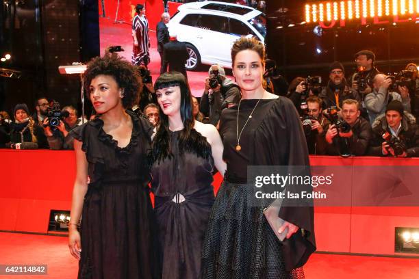 Actress Isi Laborde, irish singer Bronagh Gallagher and German actress Susanne Wolff attend the 'Return to Montauk' premiere during the 67th...