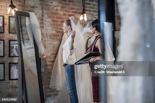 wedding dress designer and bride to be - wedding fashion show stock pictures, royalty-free photos & images