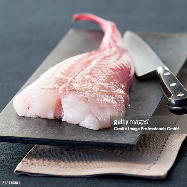 raw monkfish - anglerfish stock pictures, royalty-free photos & images