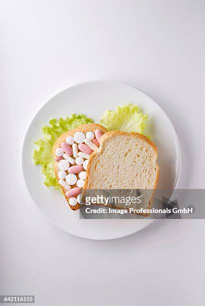 sandwich of pills - catalogna stock pictures, royalty-free photos & images