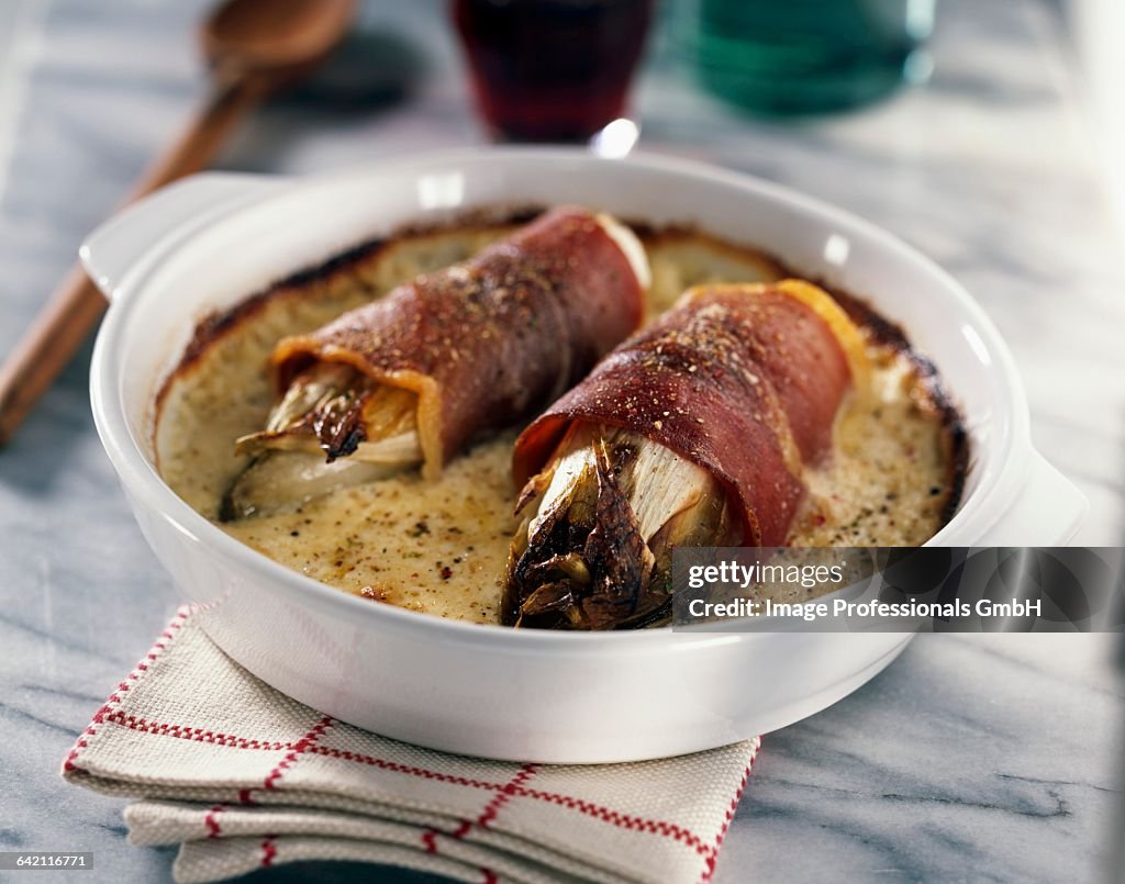 Baked chicory with ham