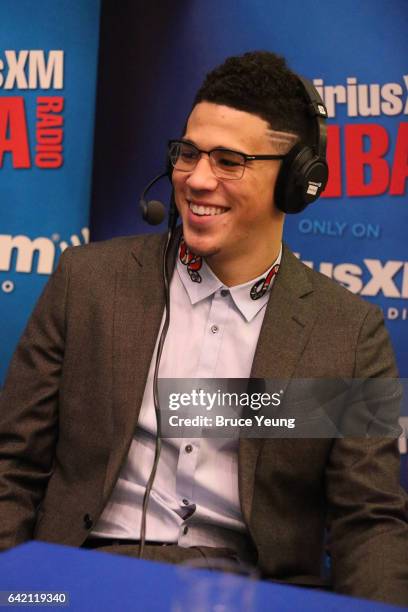 Devin Booker of the Phoenix Suns smiles during and interview at the 2017 All-Star Media Circuit at the Ritz Carlton on February 16, 2017 in New...