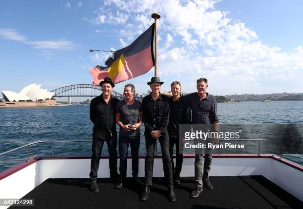 Bones Hillman, Rob Hirst, Peter Garrett, Jim Moginie and Martin Rotsey of Midnight Oil poses on Sydney Harbour after announcing their upcoming World...