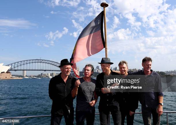 Bones Hillman, Rob Hirst, Peter Garrett, Jim Moginie and Martin Rotsey of Midnight Oil poses on Sydney Harbour after announcing their upcoming World...