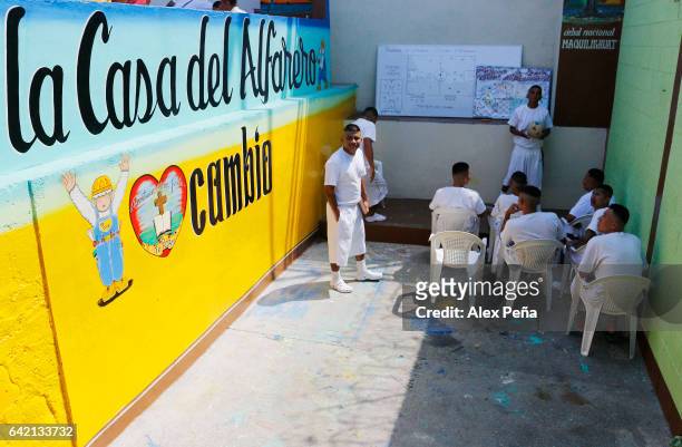 Members of the "Barrio 18 Revolucionarios" read The Bible at the San Francisco Gotera Prison on February 16, 2017 in Morazan, El Salvador. The...