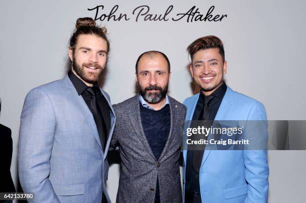 Derick Welsh, Numan Ataker and Global Luxury Ambassador Pritan Ambroase poses backstage at the John Paul Ataker Fall Winter 2017 Runway Show at Pier...