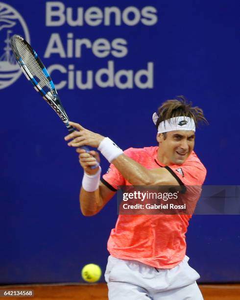 David Ferrer of Spain takes a backhand shot during a second round match between David Ferrer of Spain and Carlos Berlocq of Argentina as part of ATP...