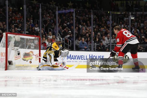 Patrick Kane of the Chicago Blackhawks skates in on Tuukka Rask of the Boston Bruins during the Discover Shootout as part of the 2017 Coors Light NHL...
