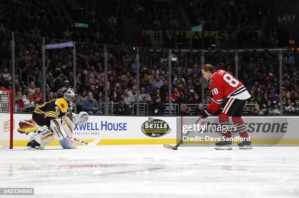 Patrick Kane of the Chicago Blackhawks skates in on Tuukka Rask of the Boston Bruins during the Discover Shootout as part of the 2017 Coors Light NHL...