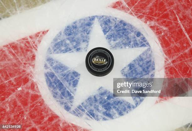 Detailed view of the official 2017 Coors Light NHL All-Star Skills Competition puck is seen on the ice during the 2017 Coors Light NHL All-Star...