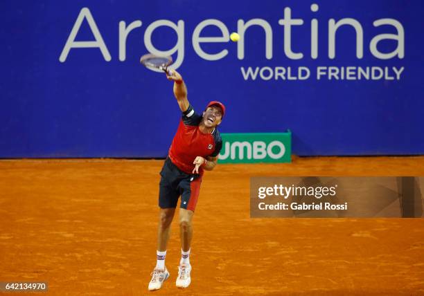 Carlos Berlocq of Argentina serves during a second round match between David Ferrer of Spain and Carlos Berlocq of Argentina as part of ATP Argentina...