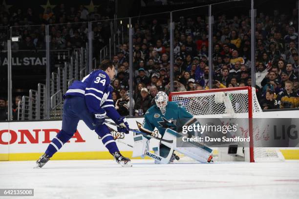 Auston Matthews of the Toronto Maple Leafs skates in on Martin Jones of the San Jose Sharks during the Discover Shootout as part of the 2017 Coors...