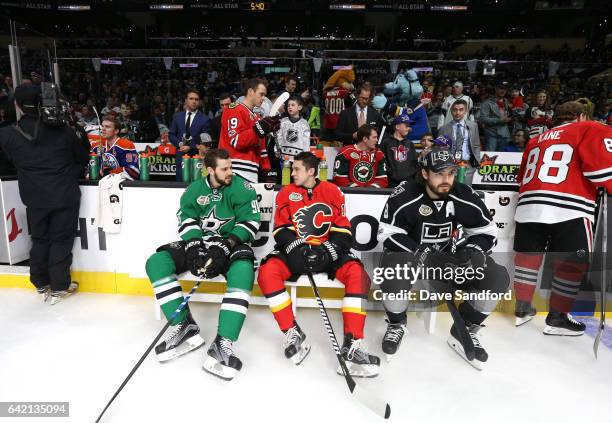 Tyler Seguin of the Dallas Stars, Johnny Gaudreau of the Calgary Flames and Drew Doughty of the Los Angeles Kings look on during the 2017 Coors Light...