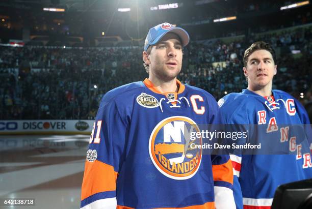 John Tavares of the New York Islanders and Ryan McDonagh of the New York Rangers look on during player introductions prior to tthe 2017 Coors Light...