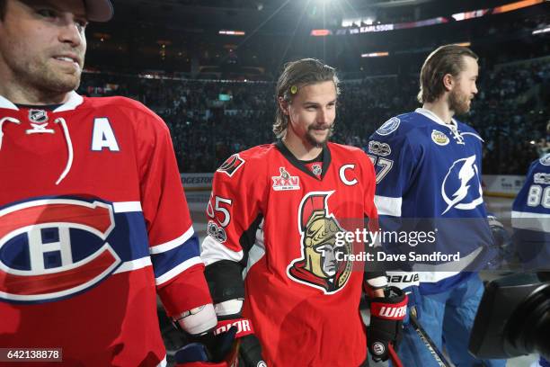 Shea Weber of the Montreal Canadiens, Erik Karlsson of the Ottawa Senators and Victor Hedman of the Tampa Bay Lightning look on during player...