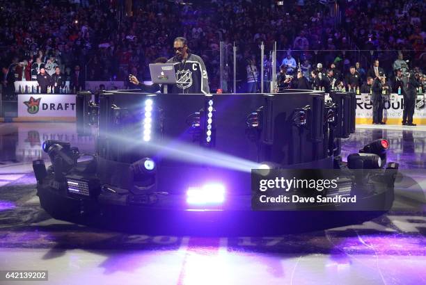 Rapper Snoop Dogg spins music and introduces the start of the 2017 Coors Light NHL All-Star Skills Competition at Staples Center on January 28, 2017...