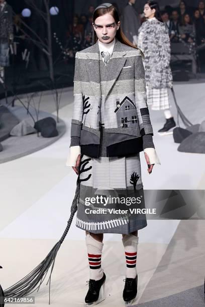 Model walks the runway at the Thom Browne Ready to Wear Fall Winter 2017-2018 fashion show during New York Fashion Week on February 15, 2017 in New...