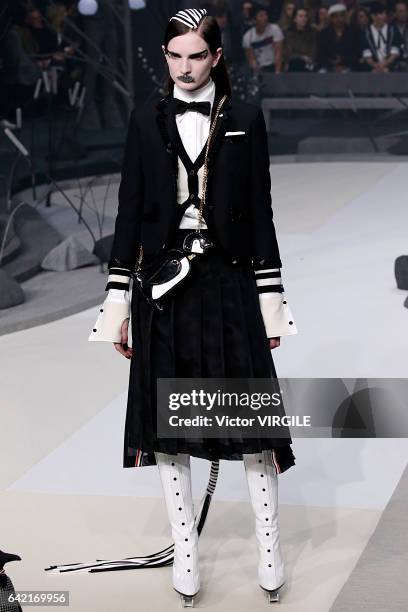 Model walks the runway at the Thom Browne Ready to Wear Fall Winter 2017-2018 fashion show during New York Fashion Week on February 15, 2017 in New...