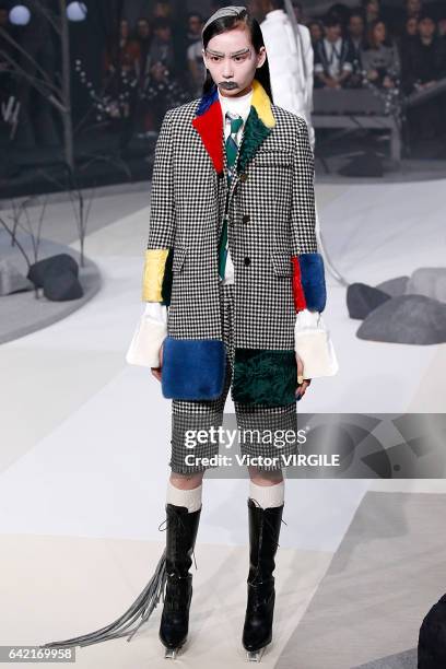 Model walks the runway at the Thom Browne Ready to Wear Fall Winter 2017-2018 fashion show during New York Fashion Week on February 15, 2017 in New...