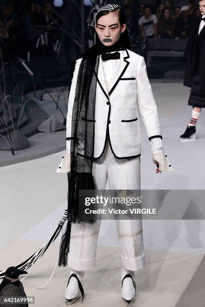 Model walks the runway at the Thom Browne Ready to Wear Fall Winter 2017-2018 fashion show during New York Fashion Week on February 15, 2017 in New...