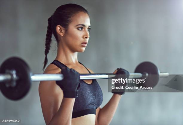 strong is the new skinny - gymnastics bar stock pictures, royalty-free photos & images