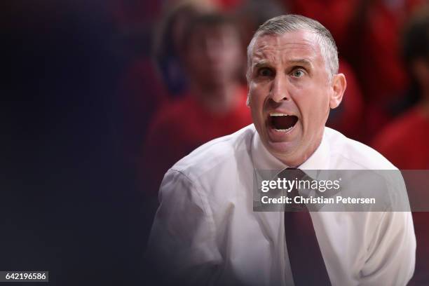 Head coach Bobby Hurley of the Arizona State Sun Devils reacts during the first half of the college basketball game against the Arizona Wildcats at...