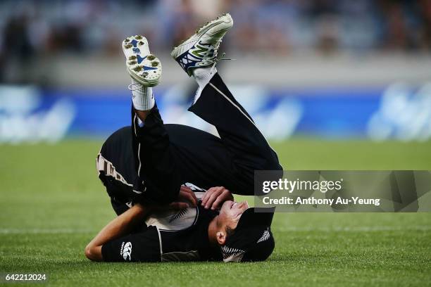 Mitchell Santner of New Zealand drops a catch during the first International Twenty20 match between New Zealand and South Africa at Eden Park on...