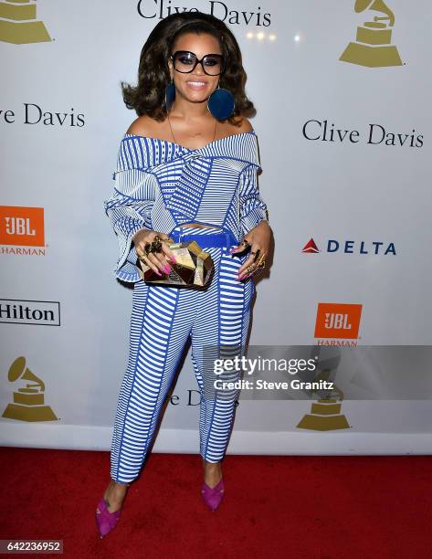 Andra Day arrives at the Pre-GRAMMY Gala and Salute to Industry Icons Honoring Debra Lee on February 11, 2017 in Los Angeles, California.