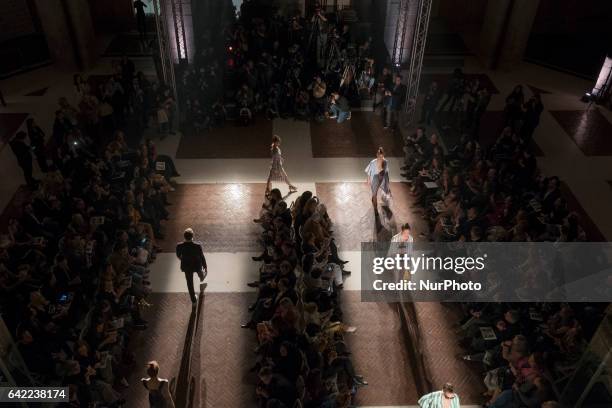 Model walks the runway at the Roberto Verino show during the Mercedes-Benz Madrid Fashion Week Autumn/Winter 2017/2018 at Correos Palace on February...