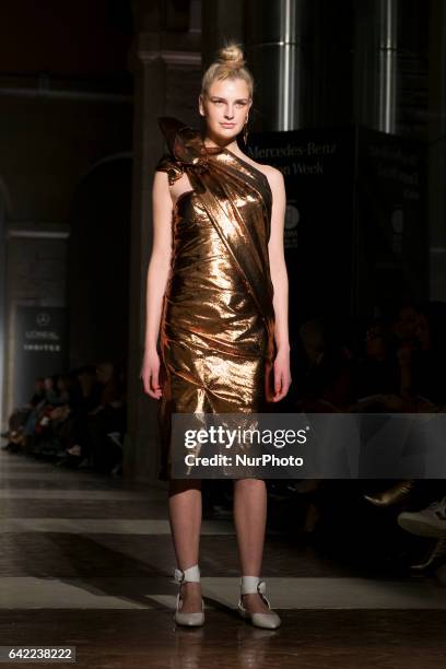 Model walks the runway at the Roberto Verino show during the Mercedes-Benz Madrid Fashion Week Autumn/Winter 2017/2018 at Correos Palace on February...