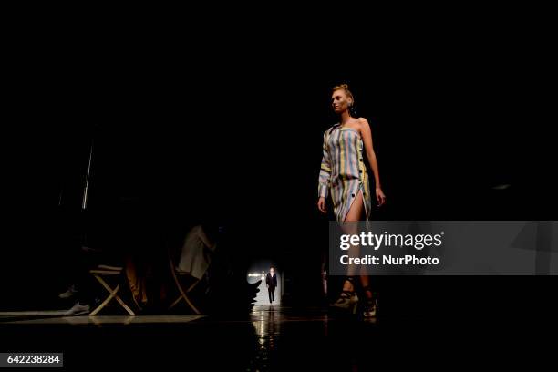 Model walks the runway at the Roberto Verino show during the Mercedes-Benz Madrid Fashion Week Autumn/Winter 2017/2018 at Correos Palace on February...