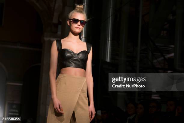 Model walks the runway at the Roberto Verino show during the Mercedes-Benz Madrid Fashion Week Autumn/Winter 2017/2018 at Correos Palace on February...