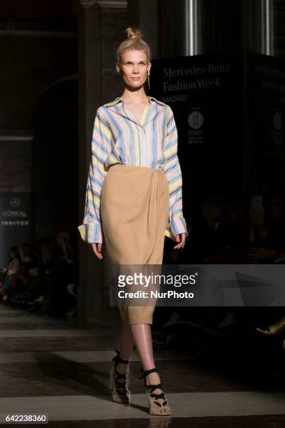 Model walks the runway at the Roberto Verino show during the Mercedes-Benz Madrid Fashion Week Autumn/Winter 2017/2018 at Correos Palace on February...
