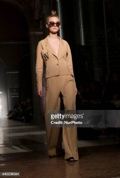 Model walks the runway at the Roberto Verino show during the Mercedes-Benz Madrid Fashion Week Autumn/Winter 2017/2018 at Correos Palace on February...