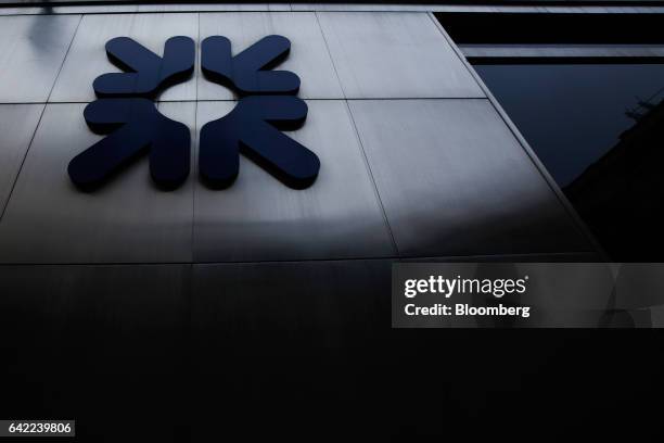 Logo sits on a wall outside a Royal Bank of Scotland Group Plc bank branch in London, U.K., on Wednesday, Feb. 15, 2017. RBS is preparing to cut more...