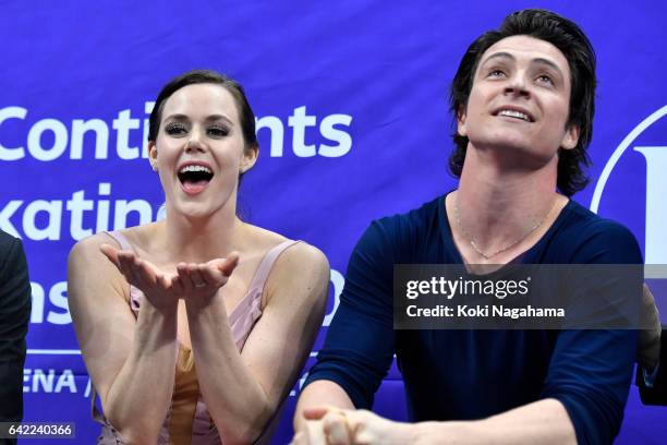 Tessa Virtue and Scott Moir of Canada celebrates at the kiss and cry after the Ice Dance Free Dance during ISU Four Continents Figure Skating...