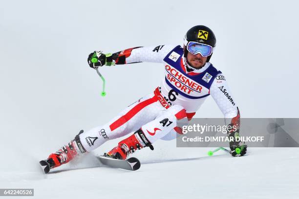 Austria's Marcel Hirscher competes in the first run of the men's giant slalom race at the 2017 FIS Alpine World Ski Championships in St Moritz on...