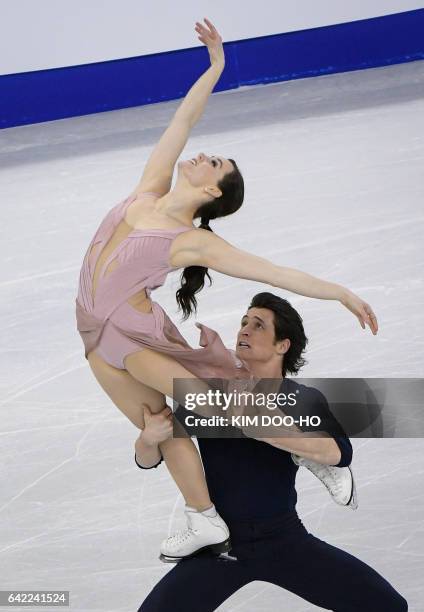 Tessa Virtue and Scott Moir of Canada perform during the ice dance free dance event at the ISU Four Continents Figure Skating Championships at the...