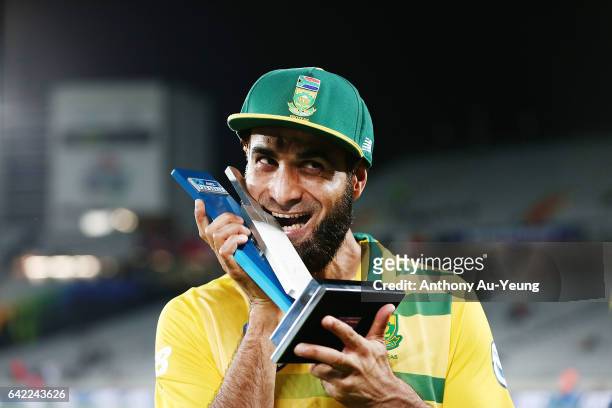 Imran Tahir of South Africa celebrates with the T20 trophy after winning the first International Twenty20 match between New Zealand and South Africa...