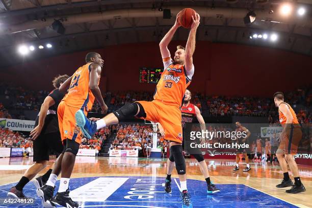 Mark worthington of the Taipans takes a rebound during the NBL Semi Final Game 1 match between Cairns Taipans and Perth Wildcats at Cairns Convention...