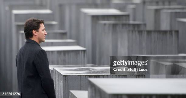 Canadian Prime Minister Justin Trudeau walks through the Memorial to the Murdered Jews of Europe, also called the Holocaust Memorial on February 17,...