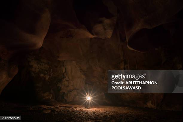 explore in chiang dao caves - cave stock pictures, royalty-free photos & images