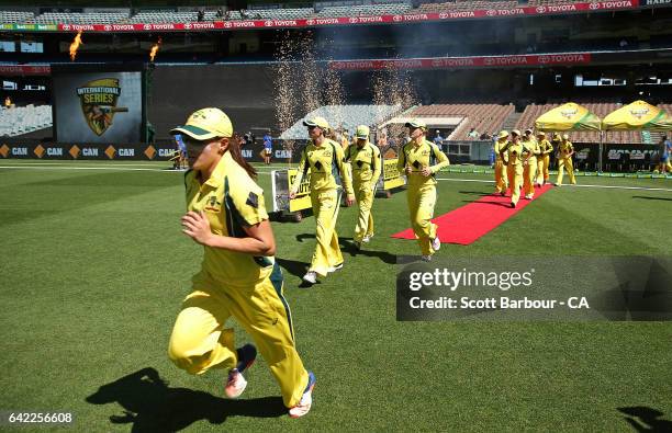 Meg Lanning of Australia leads the Southern Stars onto the field during the first Women's International Twenty20 match between Australia and New...