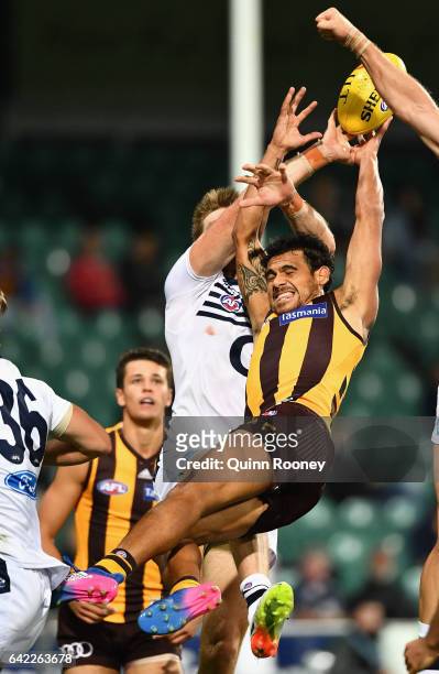 Cyril Rioli of the Hawks flies for a mark during the 2017 JLT Community Series match between the Hawthorn Hawks and the Geelong Cats at University of...