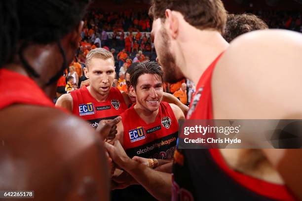 Wildcats celebrate winning the NBL Semi Final Game 1 match between Cairns Taipans and Perth Wildcats at Cairns Convention Centre on February 17, 2017...