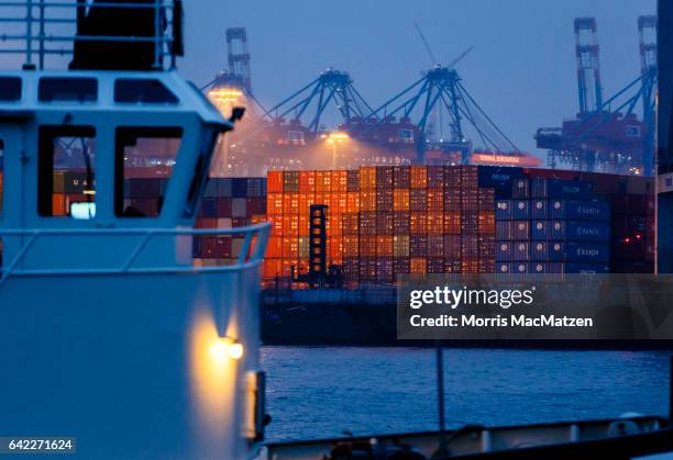 Shipping containers stand in rows in one of the many port facilities on February 16, 2017 in Hamburg, Germany. According to recent statistics German...