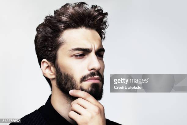 uomo elegante barbuto in posa all'aperto - elegant handsome beard man foto e immagini stock