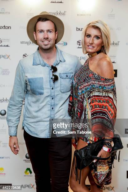 Dave Crisp and Caroline Arthur arrives at the Fashion Aid marquee at the Kennedy Twilight Beach Polo on February 17, 2017 in Melbourne, Australia.