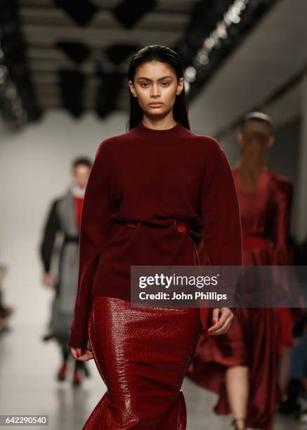 Model walks the runway at the Teatum Jones show during the London Fashion Week February 2017 collections on February 17, 2017 in London, England.